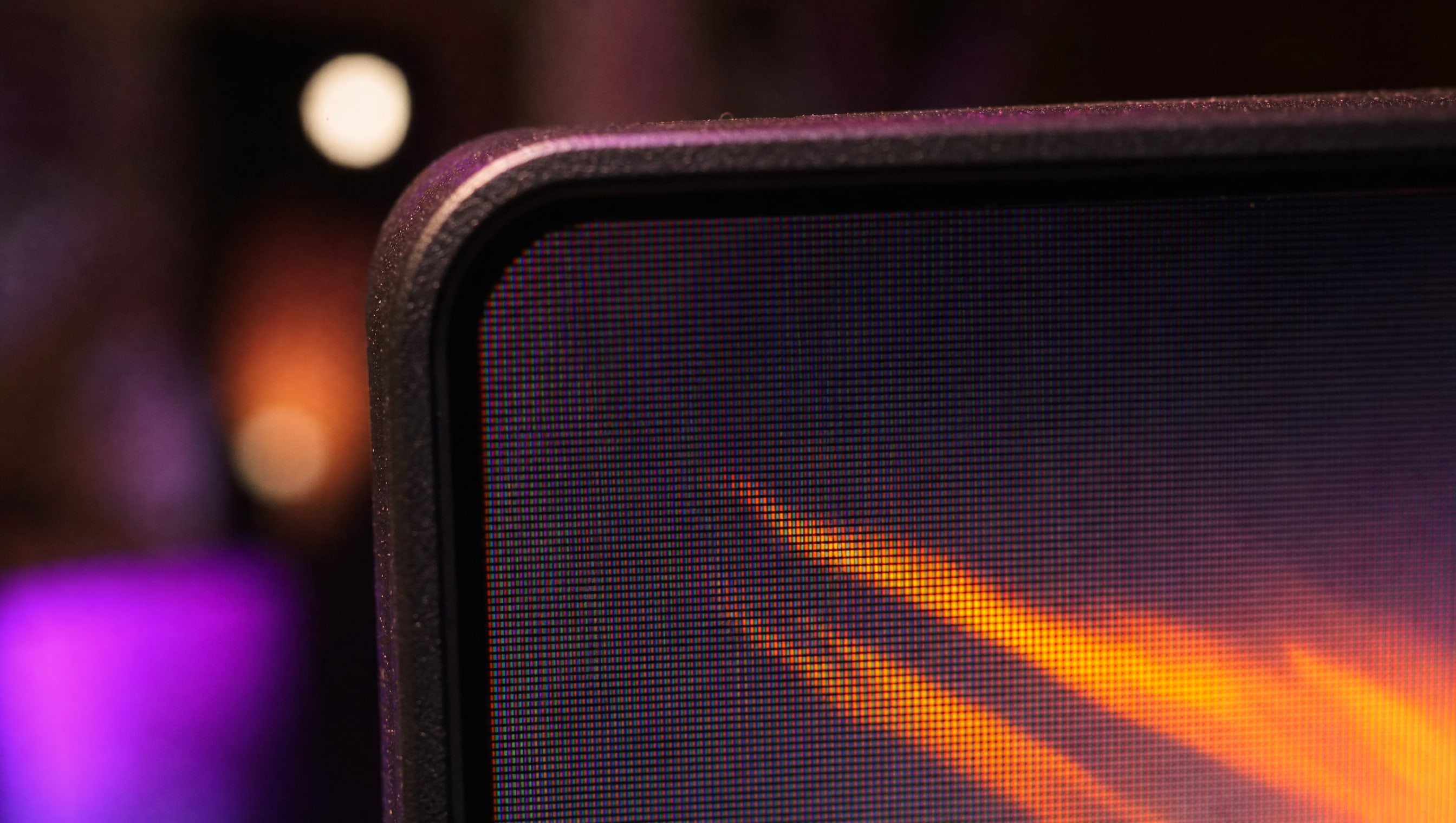 Extreme macro on the corner of a display panel, the pixel grid just resolving.